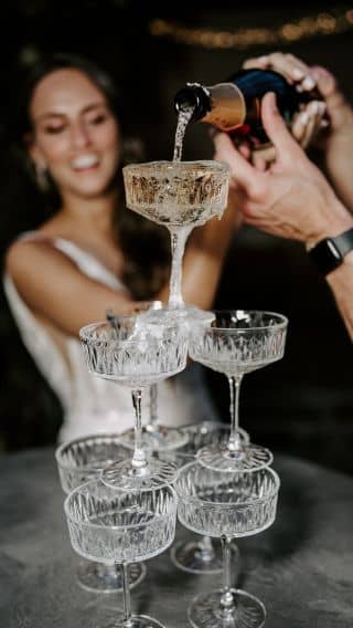 A champagne tower at weddings is becoming increasingly popular. Whether in the afternoon for a champagne reception, or in the evening before the party starts ... 🍾
popping the corks is just great fun. 🎉 

Maybe you even have a wedding guest whose birthday is? 
So you can toast directly with that one. 🥂
.
.
.
Wedding venue: @klostergut_besselich 
Hair&Makeup Styling: @beautyglowbyteresa 
Dress: @brautbluete 
Photography: @brigittefoysi 
#champagnelover #champagnetower #poppingthecork #weddingparty #elegantweddings #bridetobe #weddingdress #weddingphotography #beautifulbride #glamwedding #weddingreception #bridetobe #weddingplanner #weddingday #klostergutbesselich #sonyalpha1